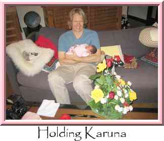 Holding Karuna Thumbnail